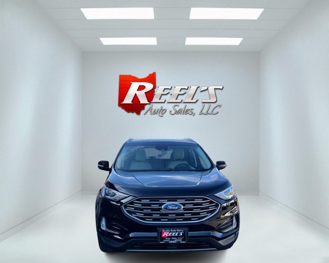 2020 Black /Beige Ford Edge Titanium AWD (2FMPK4K96LB) with an 2.0L I4 DOHC 16V Turbo engine, 8A transmission, located at 11115 Chardon Rd. , Chardon, OH, 44024, (440) 214-9705, 41.580246, -81.241943 - Photo#1